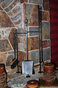 Hand forged fireplace tools by blacksmiths at Ponderosa Forge