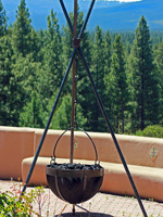 wrought iron lava rock fire pit by Ponderosa Forge