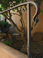 wrought iron grab railing with scroll detail 