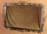wrought iron scrolled mirror